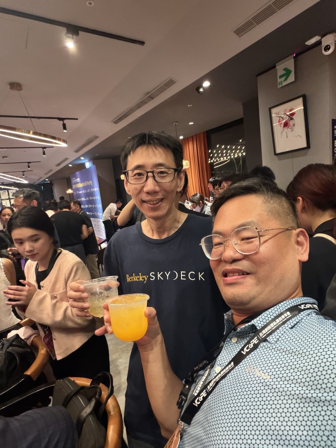 Joel Lin with a technology event participant