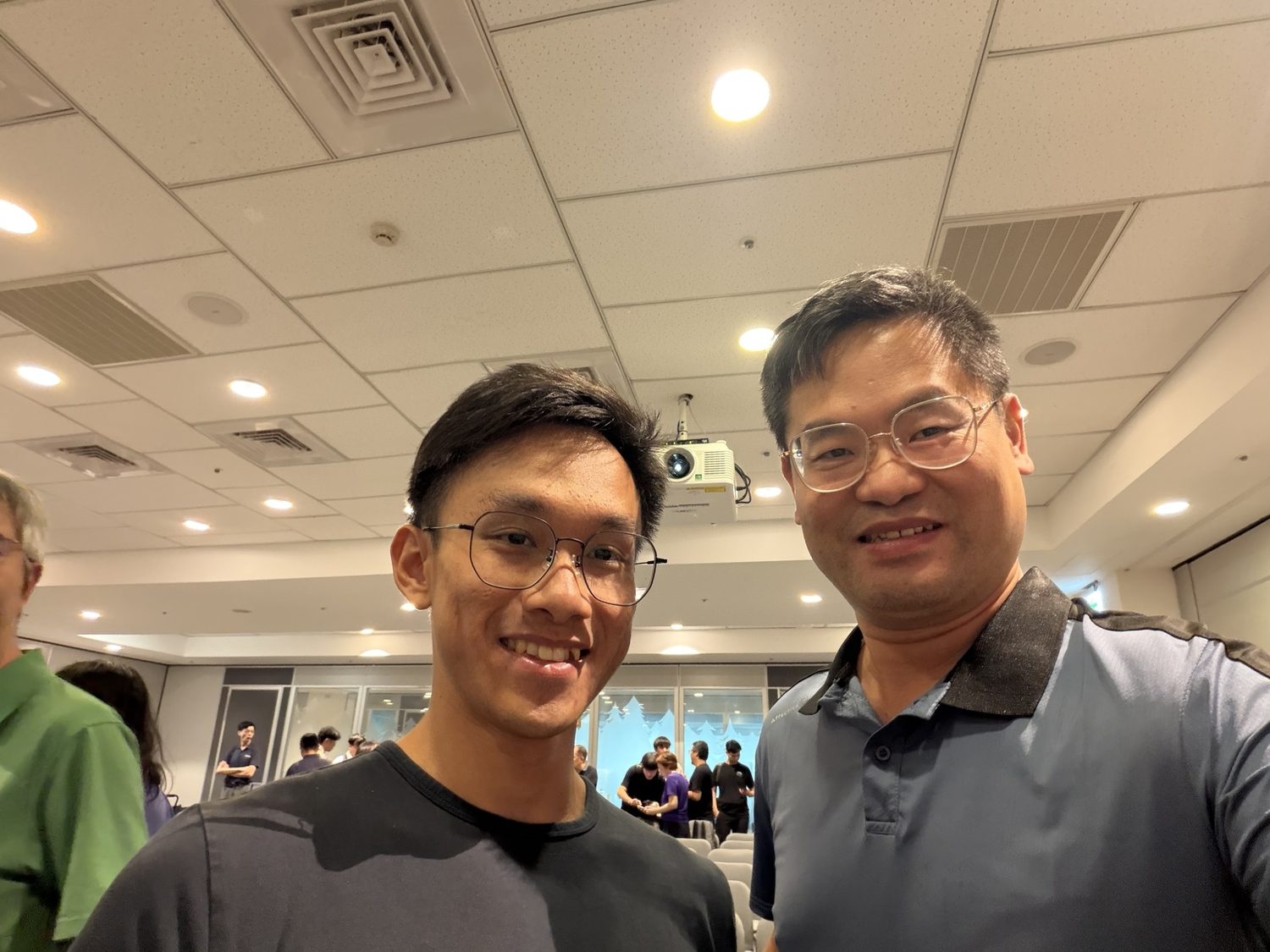 Joel Lin with a young technology conference participant